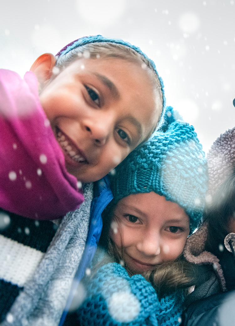 happy kids in snow