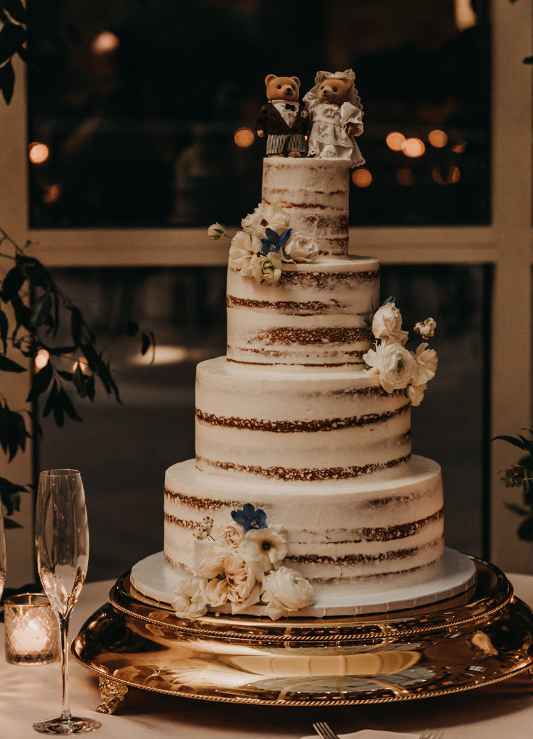 wedding cake with teddy bear topper
