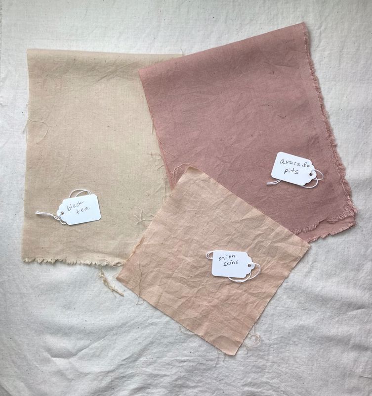 three pieces of fabric dyed in orange, pink, and light brown