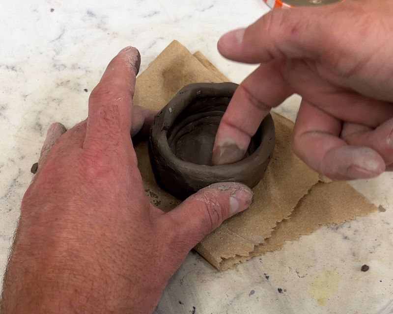 Smoothing out the texture of the individual coils.