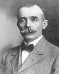 A black and white portrait of Dr. Samuel J. Crumbine, circa 1909
