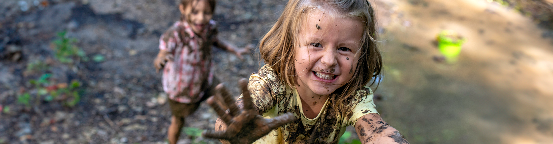 muddy girls playing