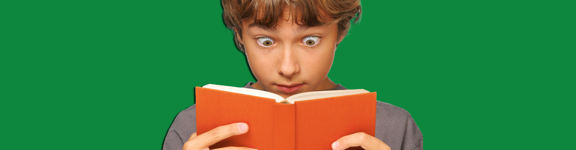 surprised kid reading
