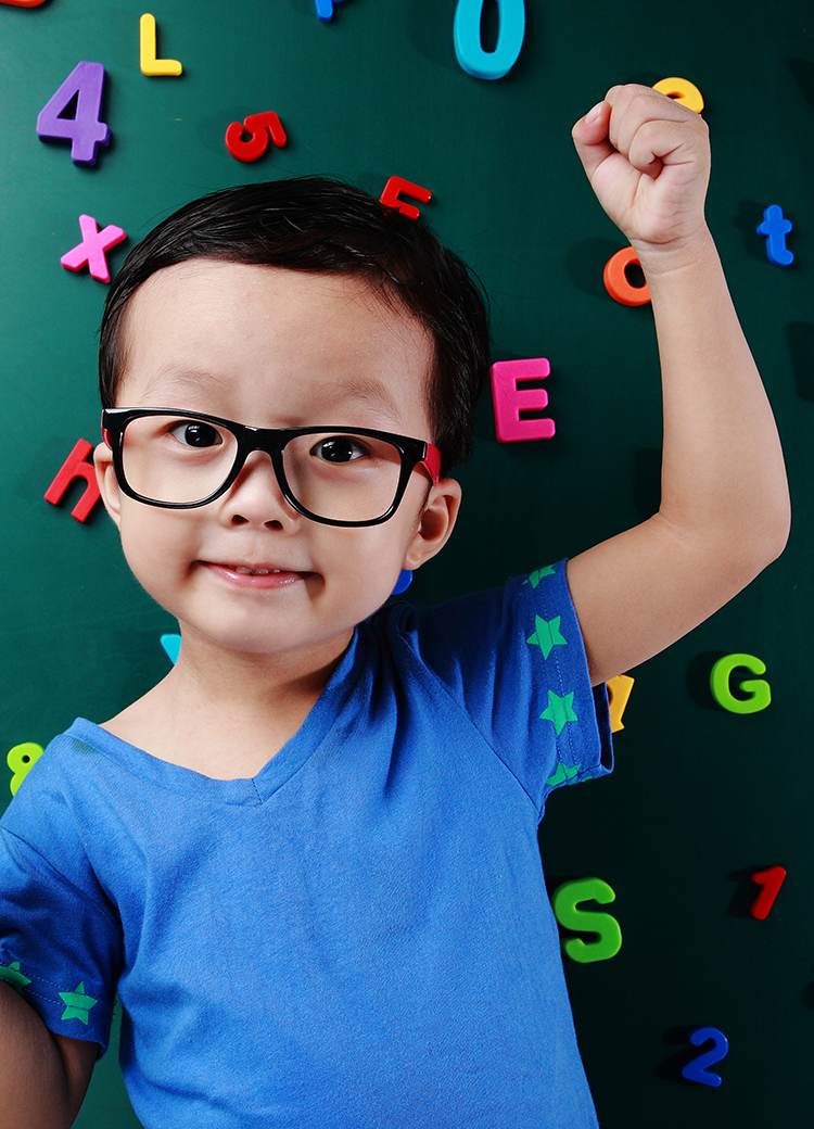 boy with letter magnets