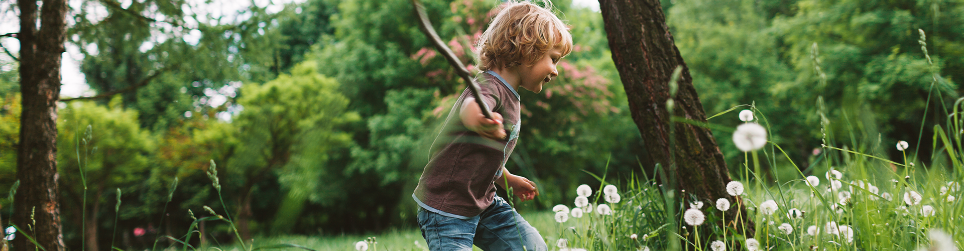 boy playing in field