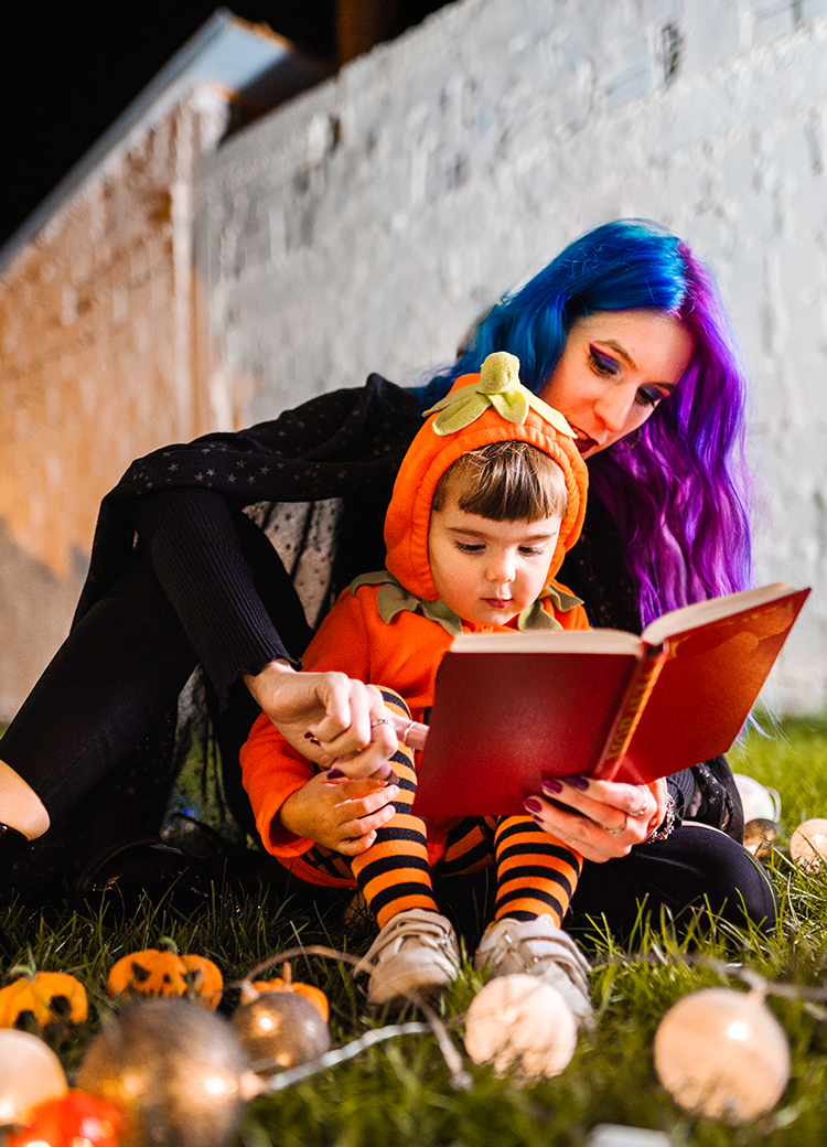 reading in Halloween costumes