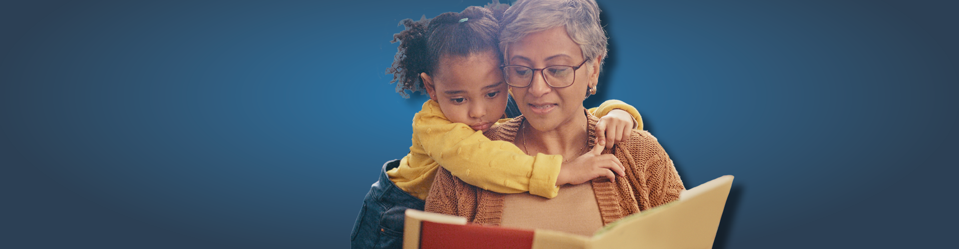 grandma reading to grandchild