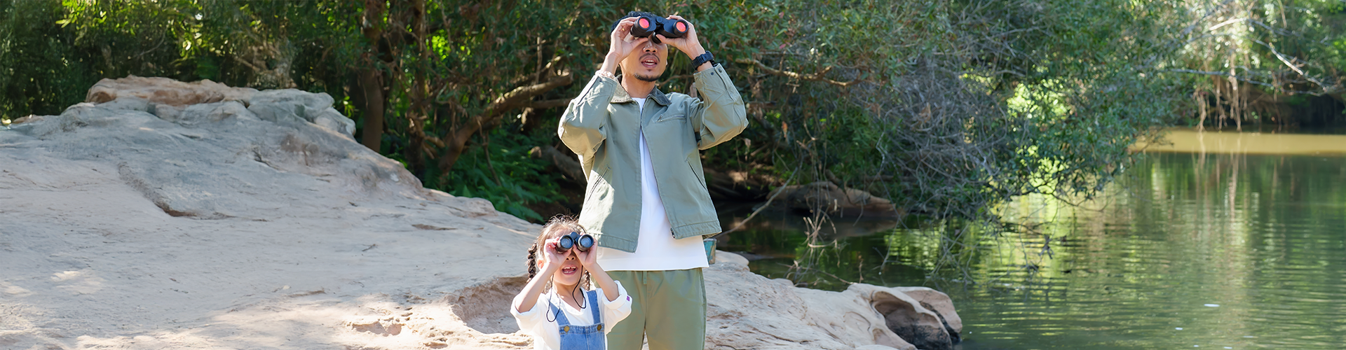 father and daughter bird watching