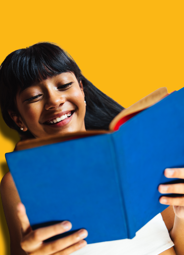 laughing teen reading