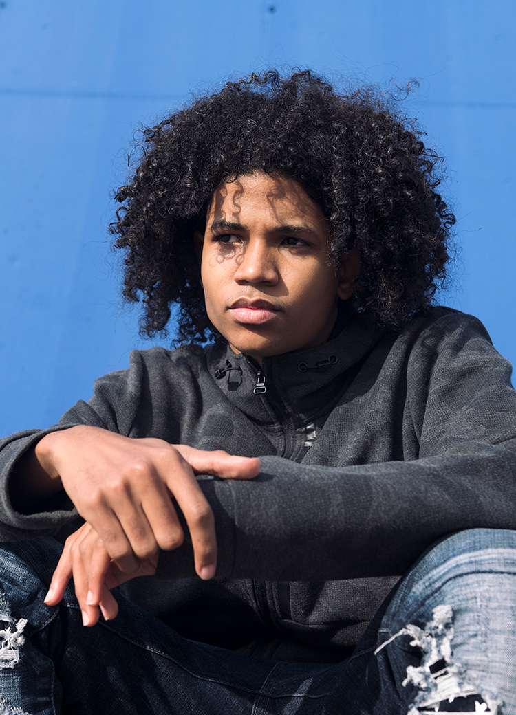 thinking teen boy