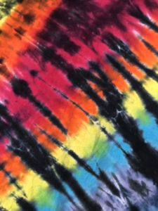 Close up of pattern of reverse tie-dye technique.