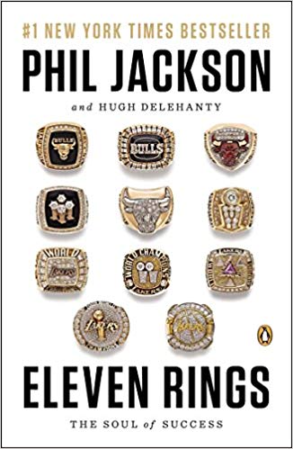 Cover of book Eleven Rings with images of the championship rings Phil Jackson won