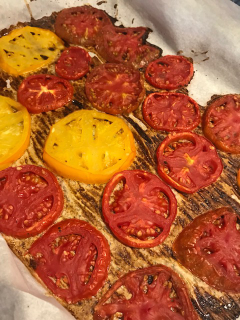 tomatoes on a baking sheet