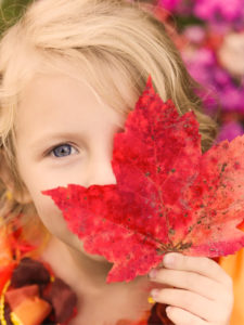 Girl Posing with Leaf