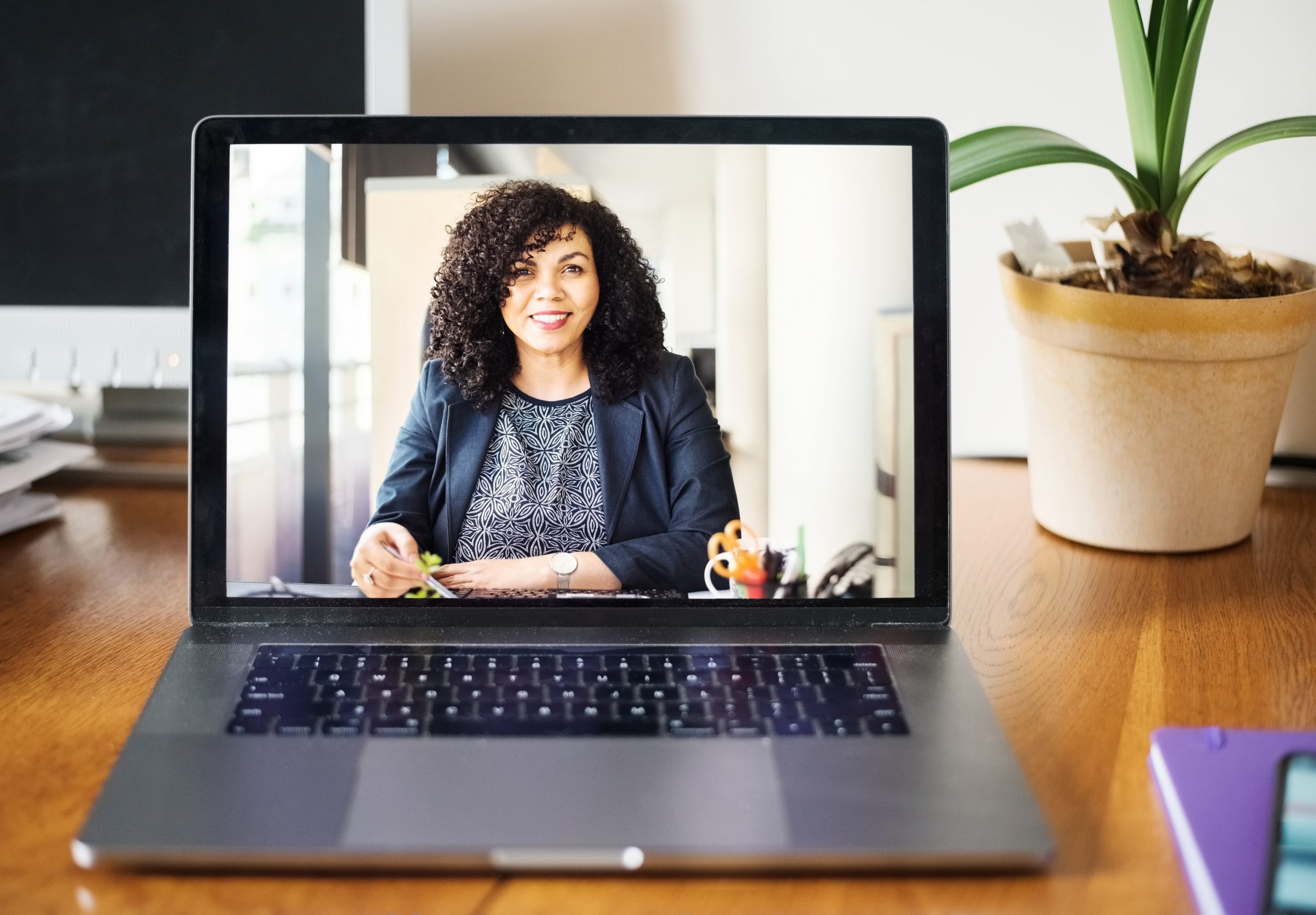 businesswoman having a video call on a laptop