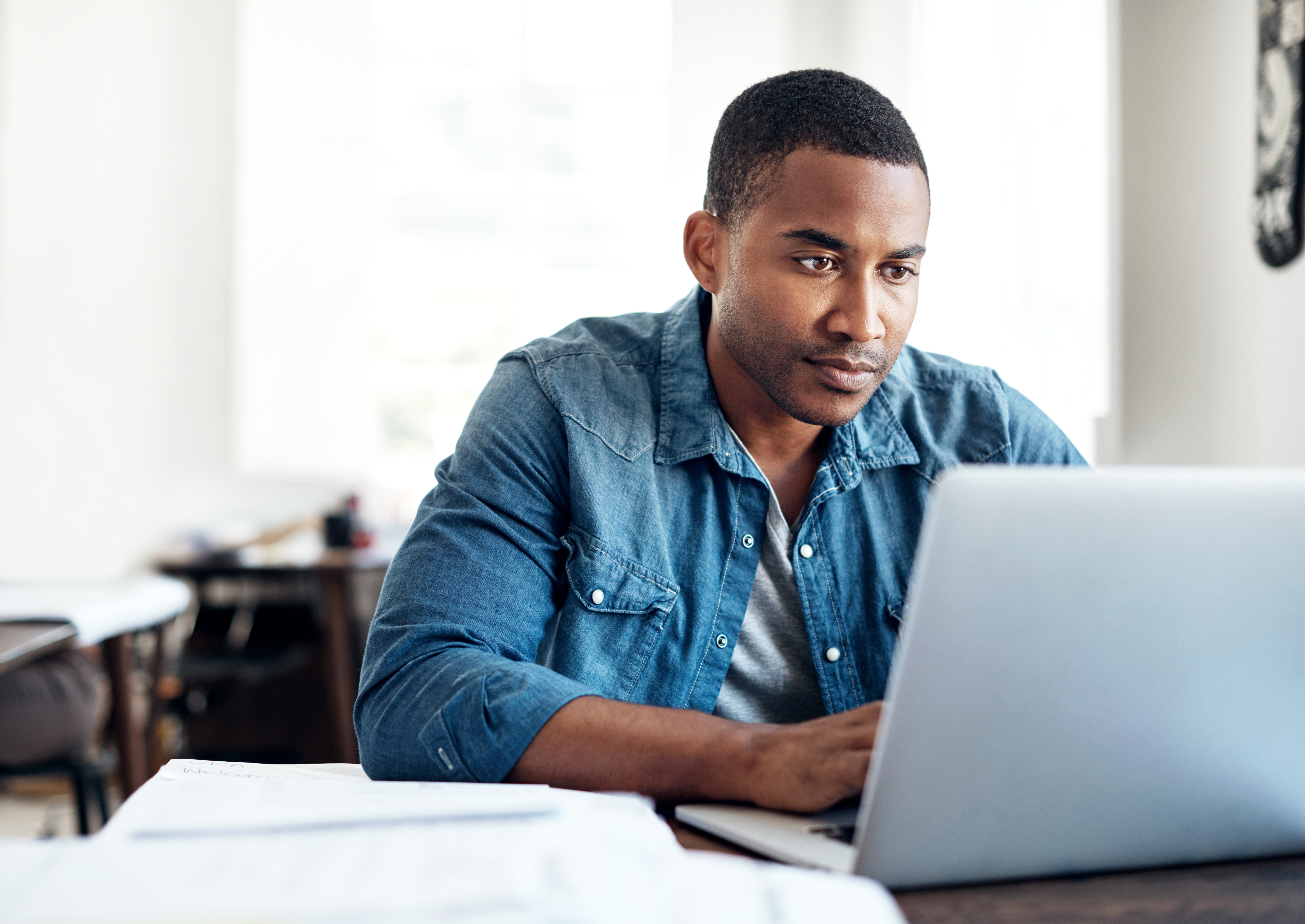 young man working at a computer