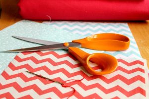 scissors on brightly colored fabric