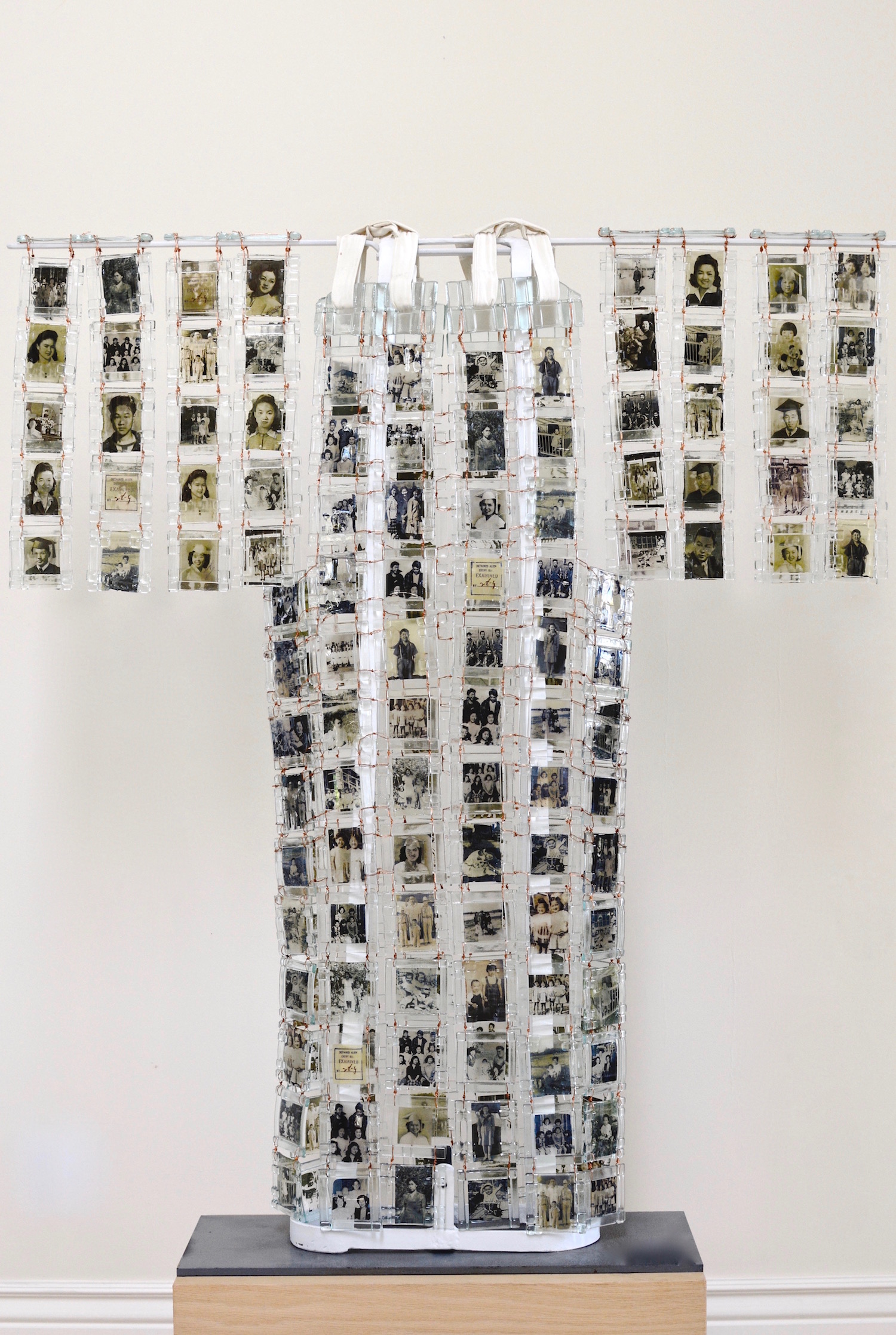 image of kimono made of glass panels with photographs on them