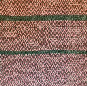 pink and green woven fabric