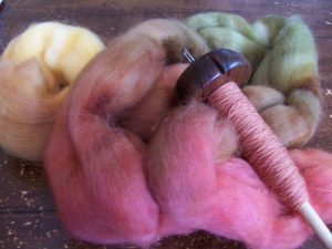 spindle with wool