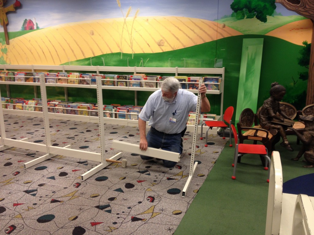 Dave Perkins assembling shelving