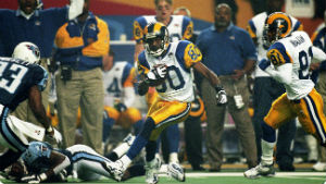 Isaace Bruce hauls in the game winning touchdown in Super Bowl XXXIV